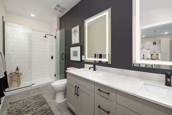 Spacious bathroom featuring modern fixtures at The Signal Apartments