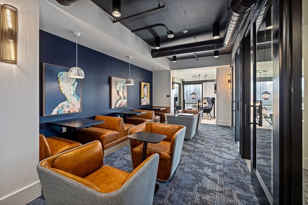 Clubhouse with modern design at The Signal Apartments, featuring leisure spaces and luxury living in an upscale community setting