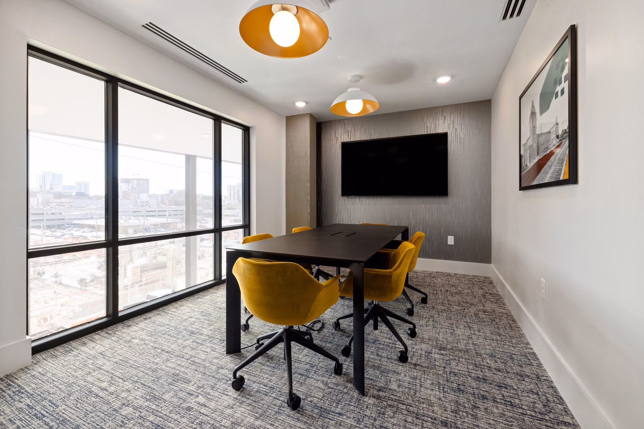 Clubhouse featuring modern design and cozy seating at The Signal Apartments Perfect for social gatherings and events