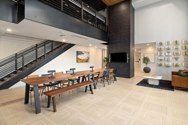 The Signal Apartments: Contemporary clubhouse with stylish decor and seating areas