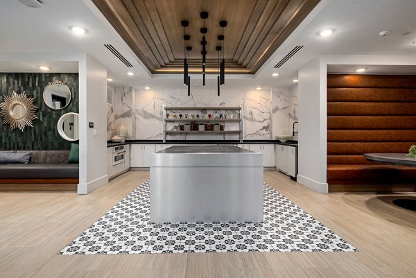 Clubhouse featuring modern design and cozy seating at The Signal Apartments, a luxury property by Greystar in a vibrant urban setting