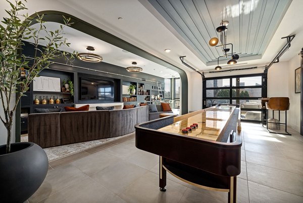 Clubhouse featuring modern design and vibrant decor at The Signal Apartments, a Greystar property