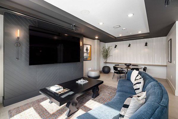 Clubhouse with modern design and seating areas at The Signal Apartments
