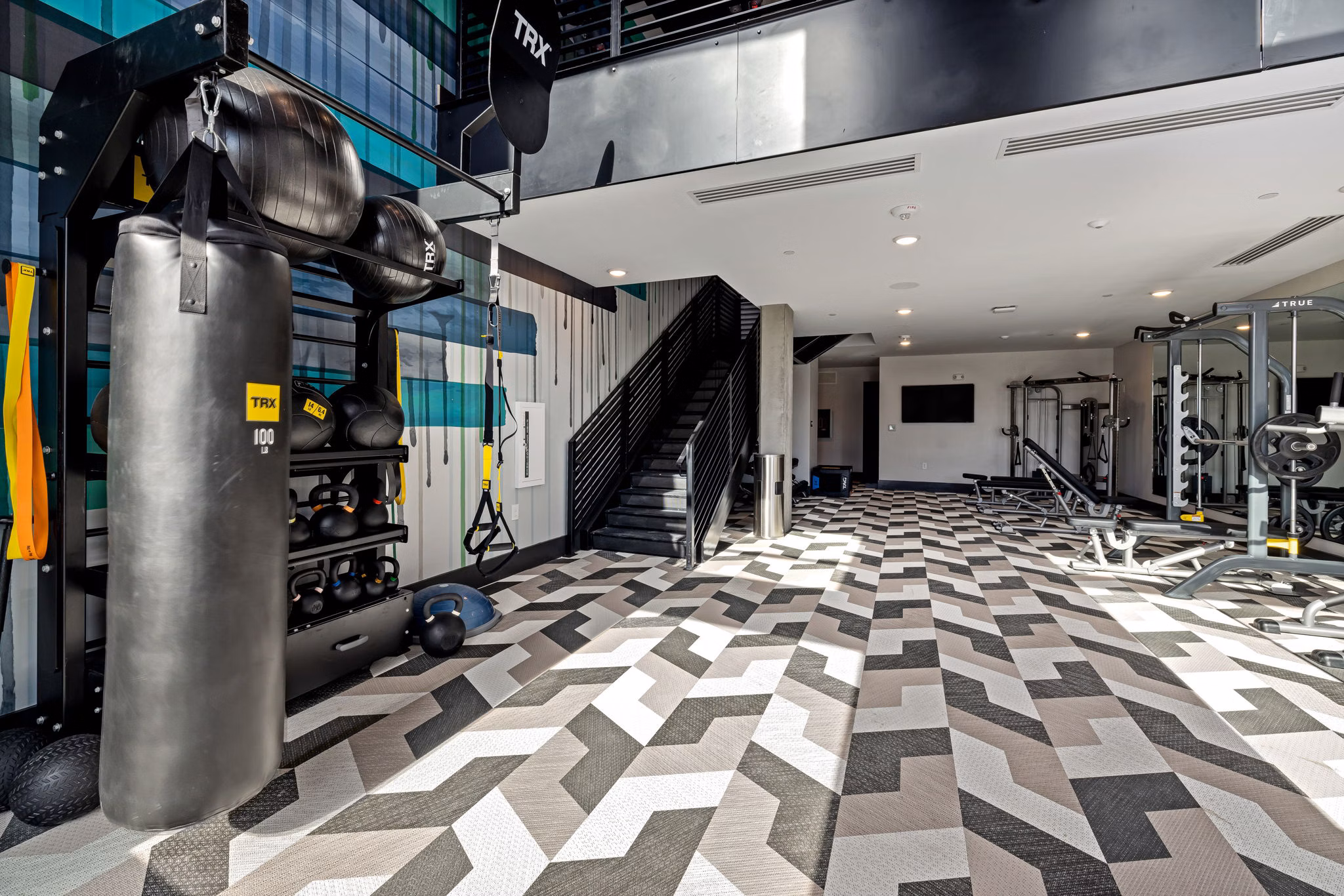 Modern fitness center featuring state-of-the-art equipment at The Signal Apartments