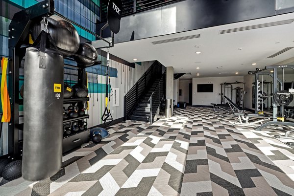 Modern fitness center featuring state-of-the-art equipment at The Signal Apartments
