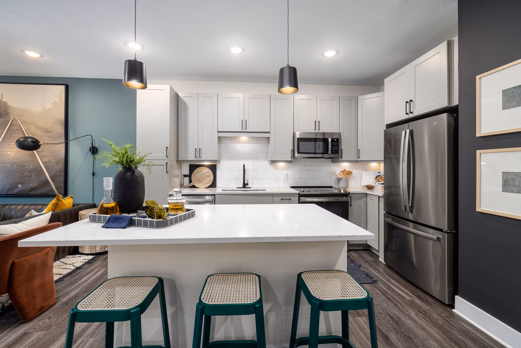 Modern kitchen with stainless steel appliances at The Signal Apartments