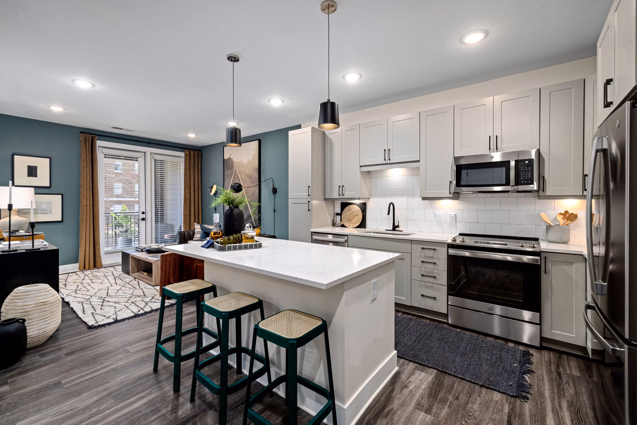 Modern kitchen featuring stainless steel appliances at The Signal Apartments, a Greystar luxury living community