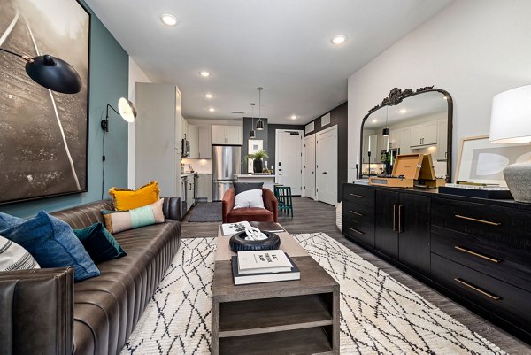 Stylish living room with modern decor in The Signal Apartments, featuring luxury design and functional space for comfortable living