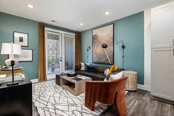 Modern living room with stylish decor in The Signal Apartments