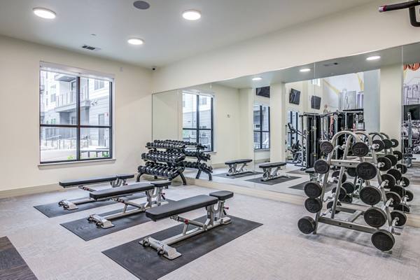 fitness center at The Huntley Apartments