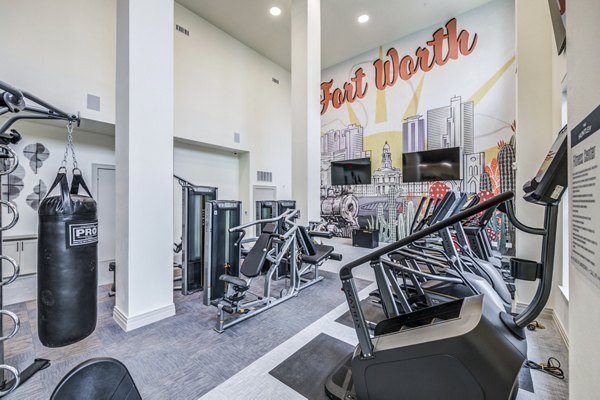 fitness center at The Huntley Apartments