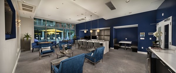 Contemporary clubhouse with stylish seating and decor at Next on Lex Apartments in Glendale, ideal for socializing and relaxation