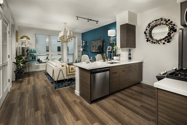 Living room with modern decor and large windows in Next on Lex Apartments, luxury interiors offering comfort and style in the heart of Glendale
