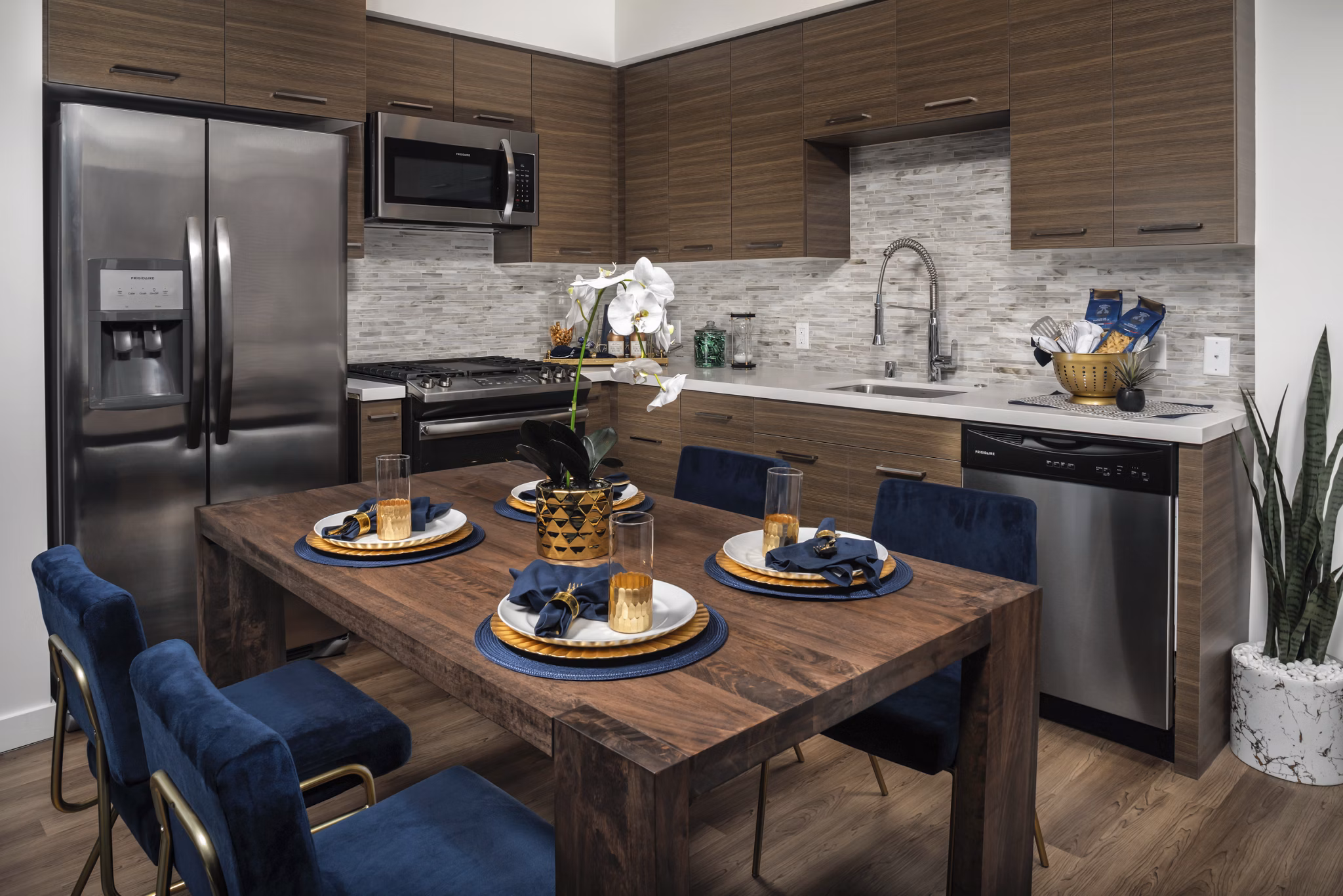 Modern kitchen with stainless steel appliances at Next on Lex Apartments in Glendale