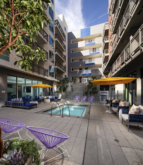 Tranquil courtyard with lush greenery at Next on Lex Apartments, offering luxury living in the heart of Glendale