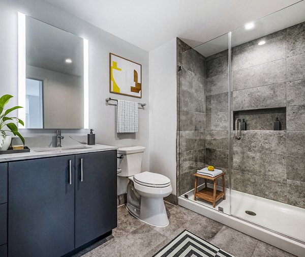 Modern bathroom featuring sleek fixtures at Gallery 64 Apartments