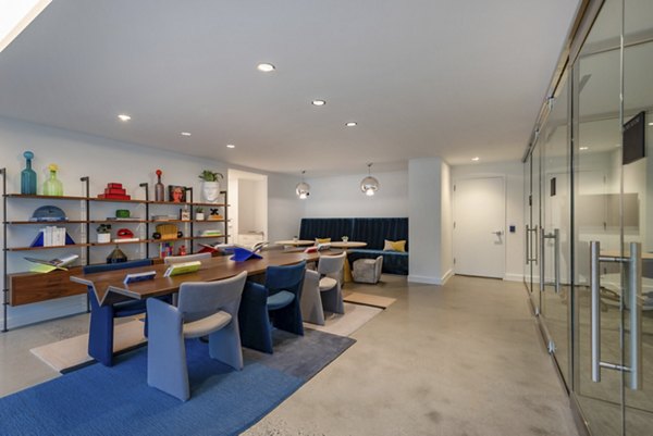 Clubhouse with modern decor and comfortable seating at Gallery 64 Apartments