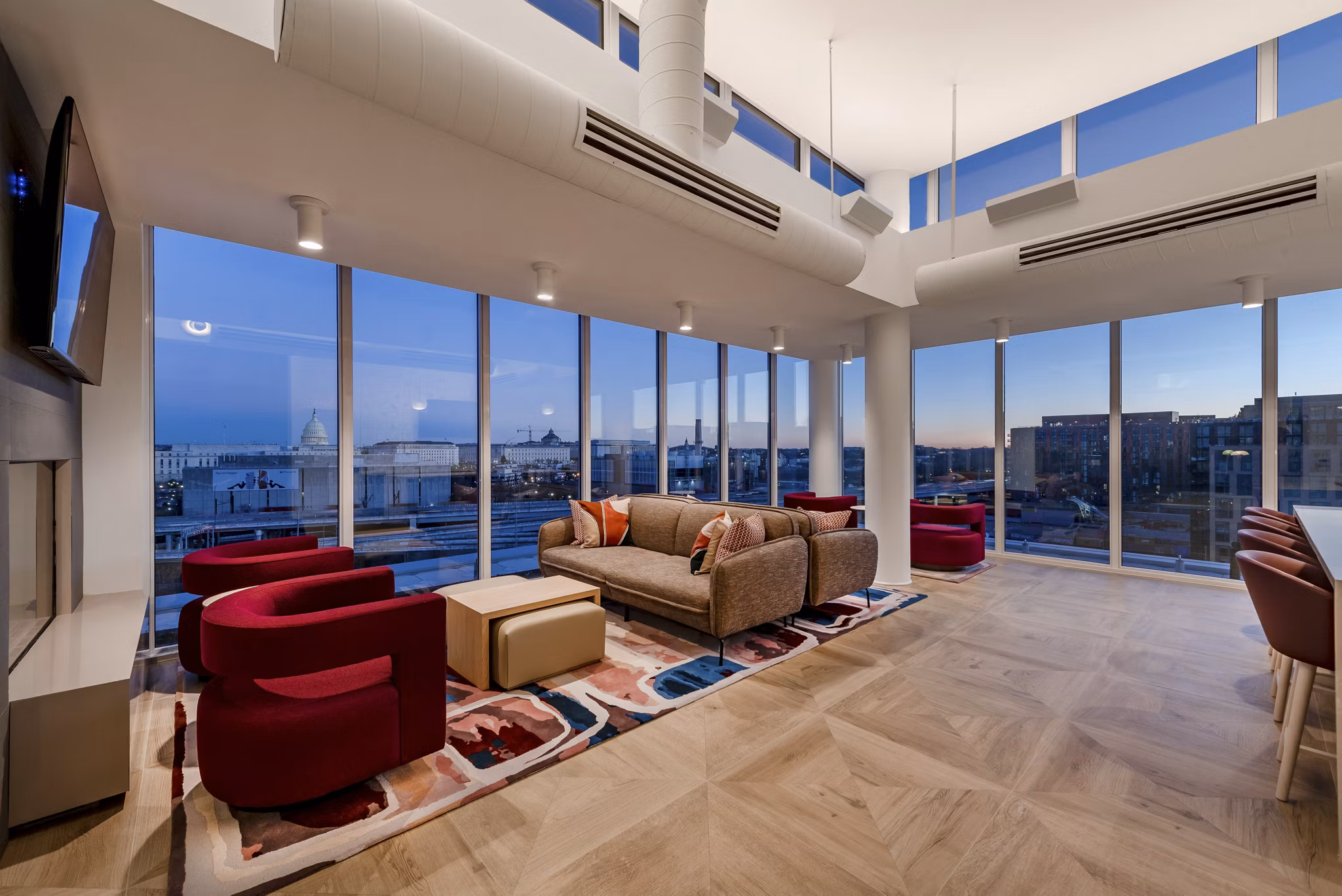 Modern clubhouse with stylish seating and decor at Gallery 64 Apartments