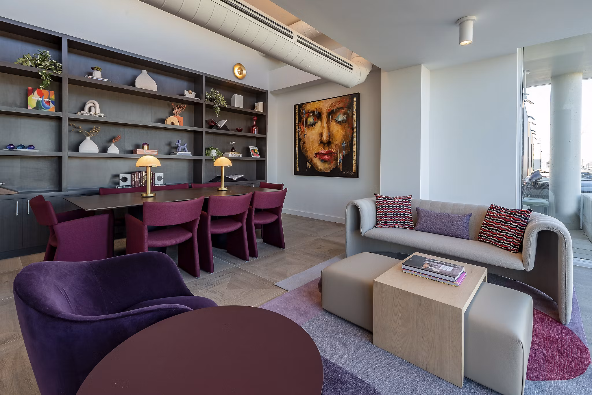 Clubhouse with modern design and seating areas at Gallery 64 Apartments
