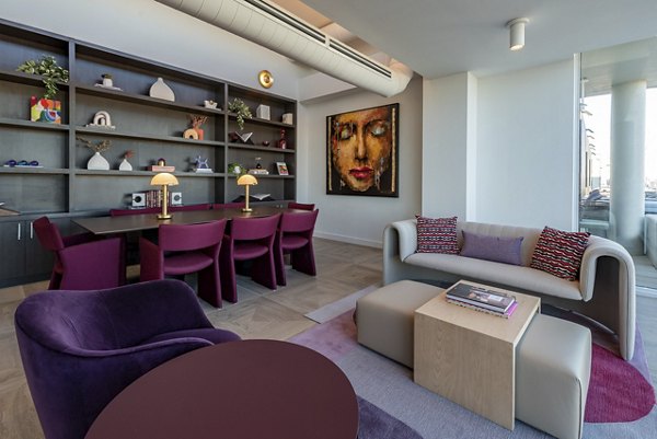 Clubhouse with modern design and seating areas at Gallery 64 Apartments