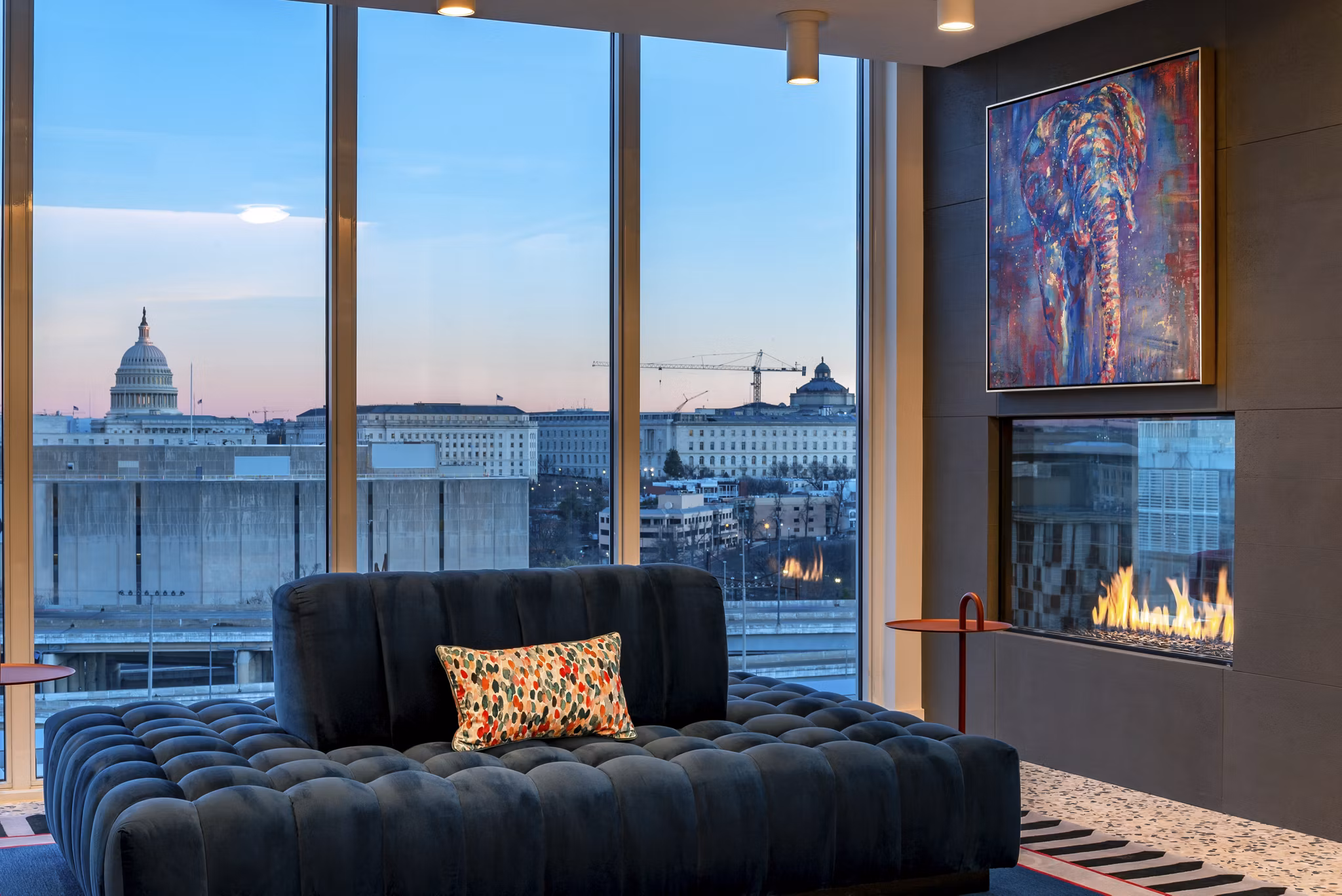 Modern clubhouse featuring stylish seating and artistic decor at Gallery 64 Apartments, a luxurious Greystar community