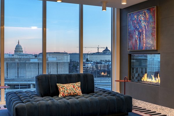 Modern clubhouse featuring stylish seating and artistic decor at Gallery 64 Apartments, a luxurious Greystar community