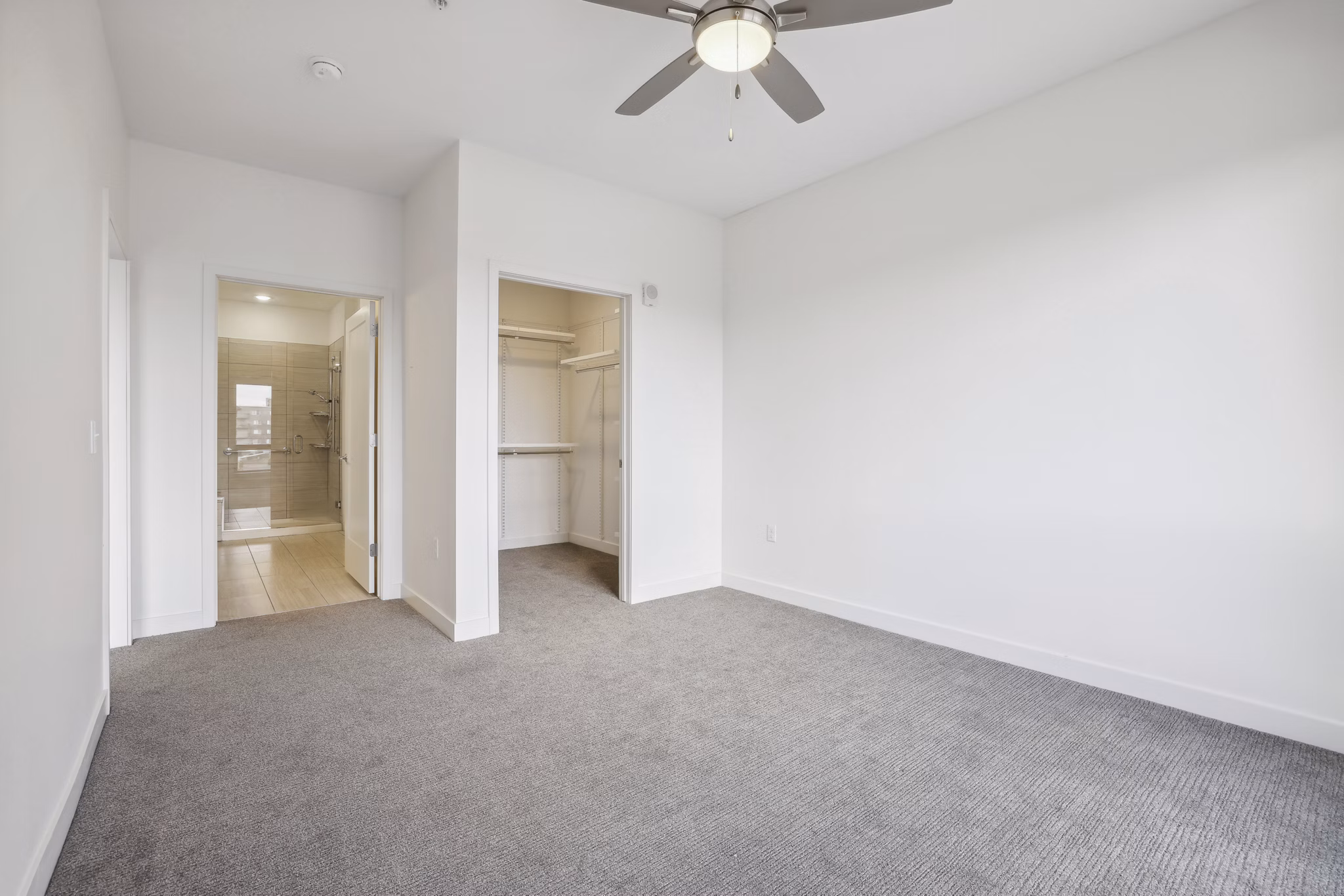 Bedroom featuring modern design and cozy furnishings at Avidor Edina Apartments, luxury living for active adults in a prime location