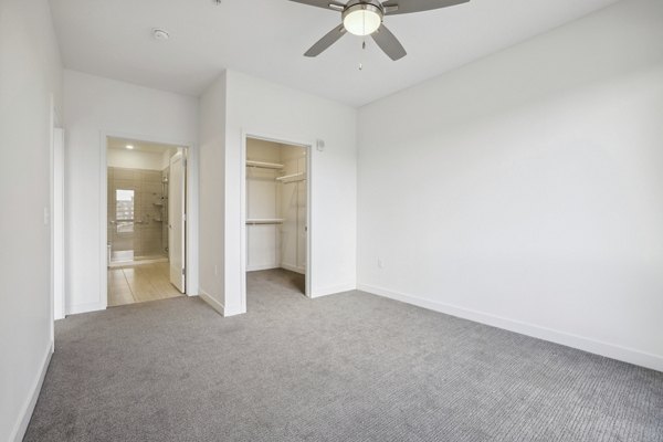 Bedroom featuring modern design and cozy furnishings at Avidor Edina Apartments, luxury living for active adults in a prime location