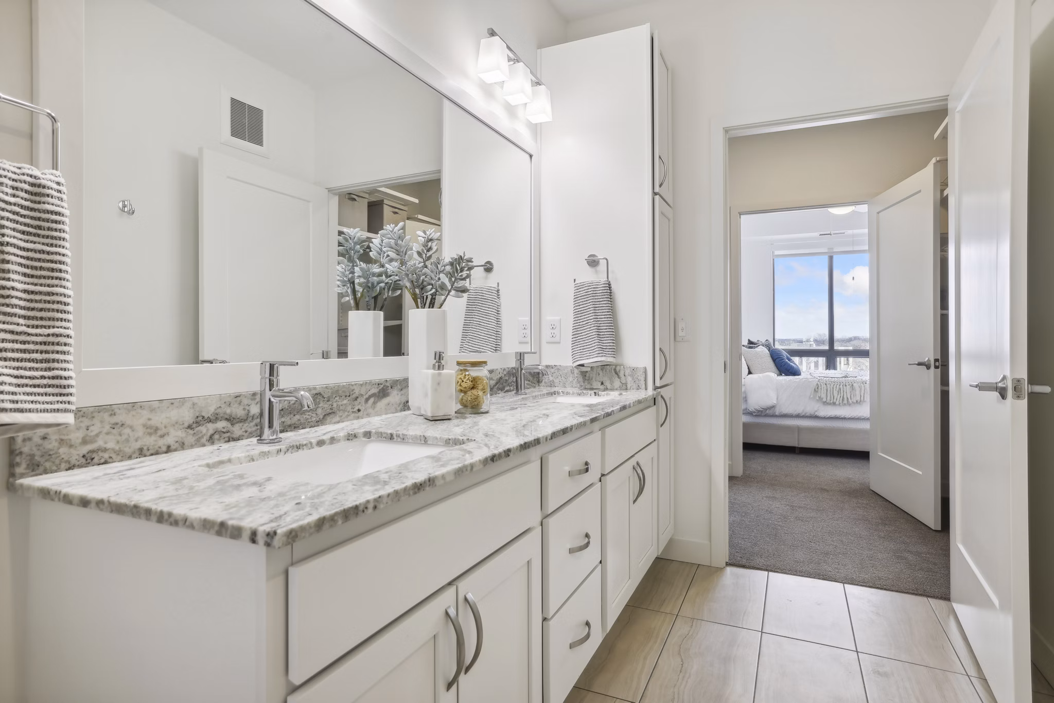 Elegant bathroom with modern fixtures at Avidor Edina Apartments, offering luxury living and sophisticated design features