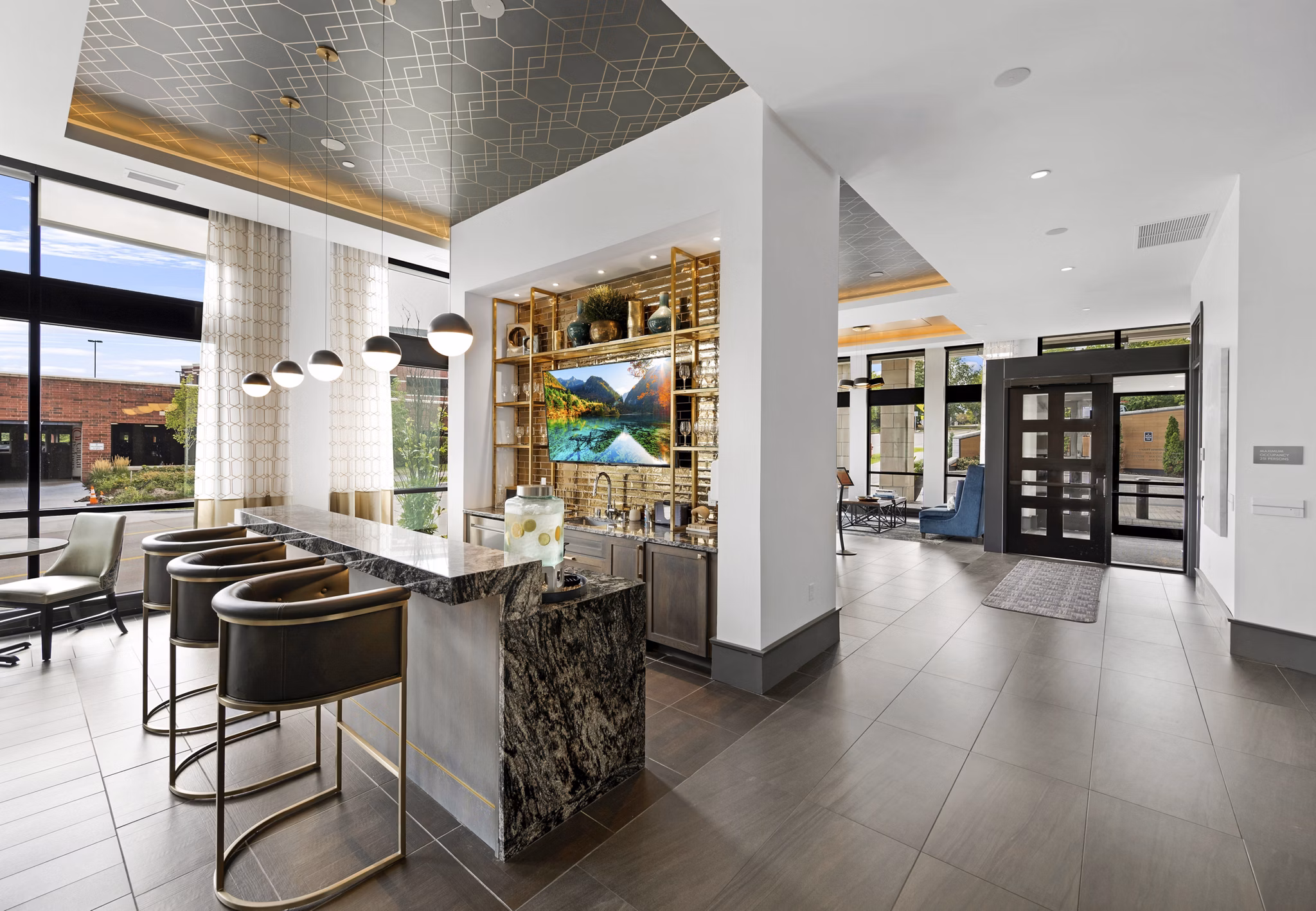 Clubhouse featuring modern furnishings and social spaces at Avidor Edina Apartments, a luxury community for active adults