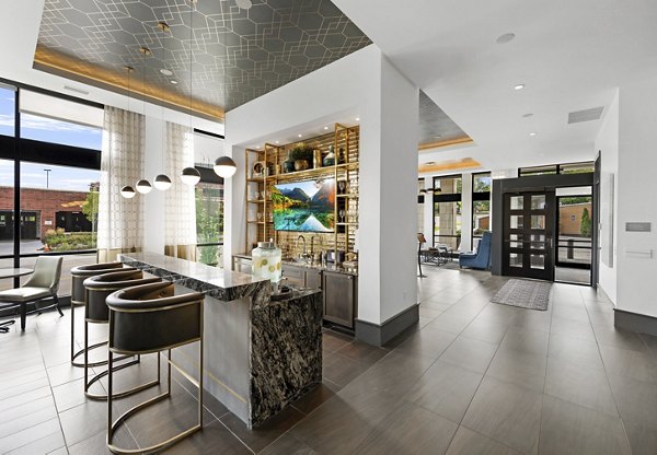 Clubhouse featuring modern furnishings and social spaces at Avidor Edina Apartments, a luxury community for active adults