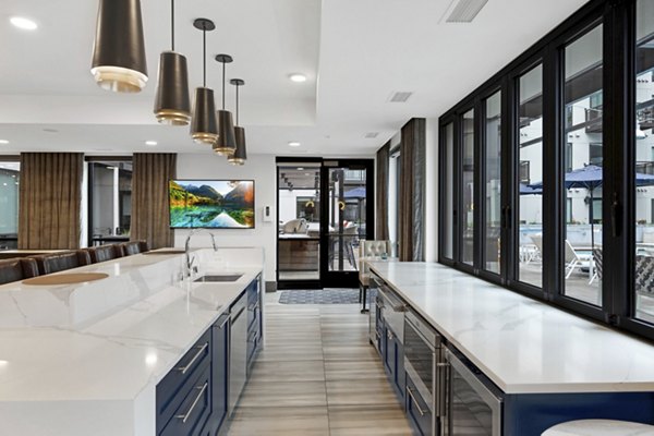Clubhouse featuring modern design and plush seating at Avidor Edina Apartments