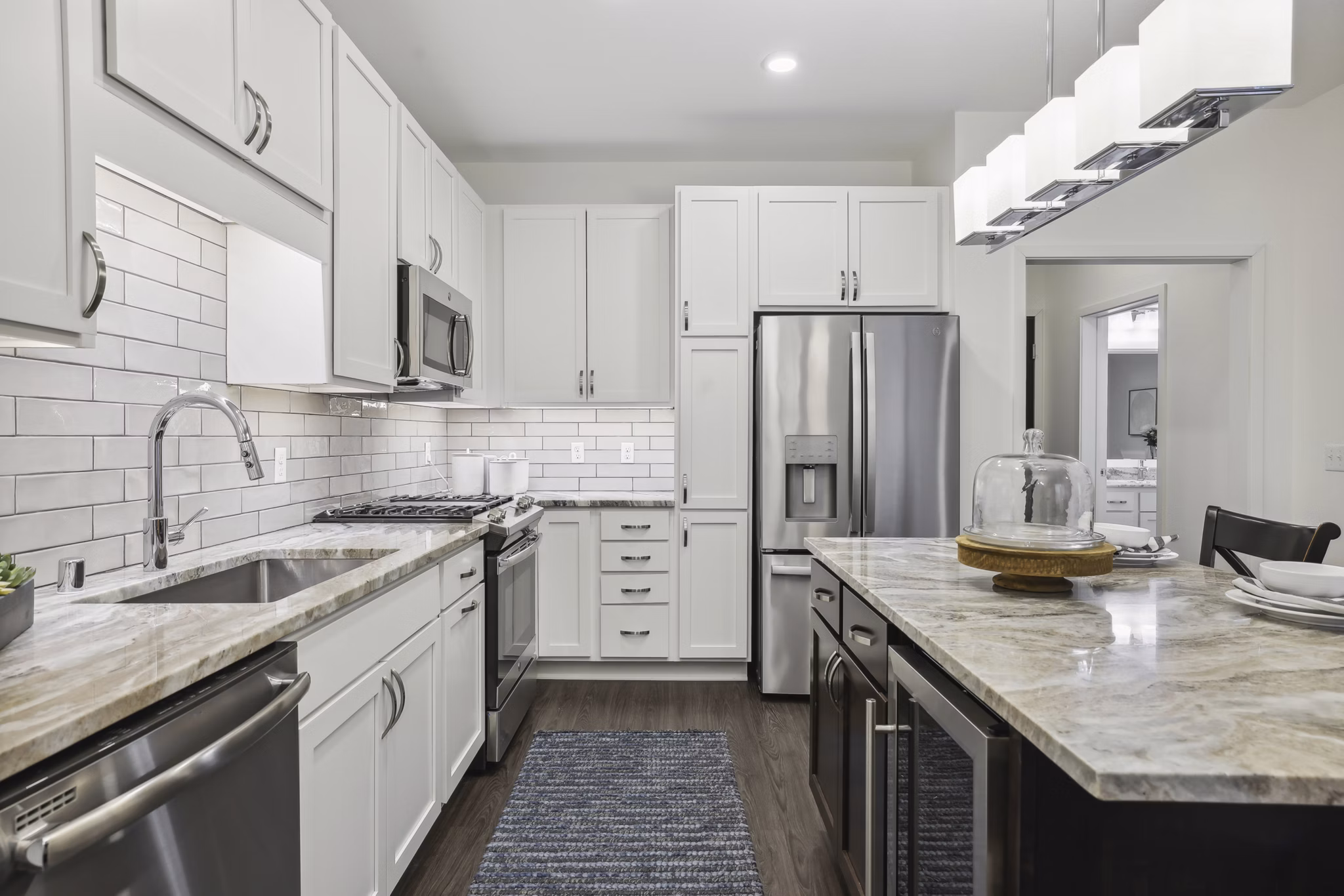 Modern kitchen with stainless steel appliances at Avidor Edina Apartments, a luxury community for stylish living in Edina