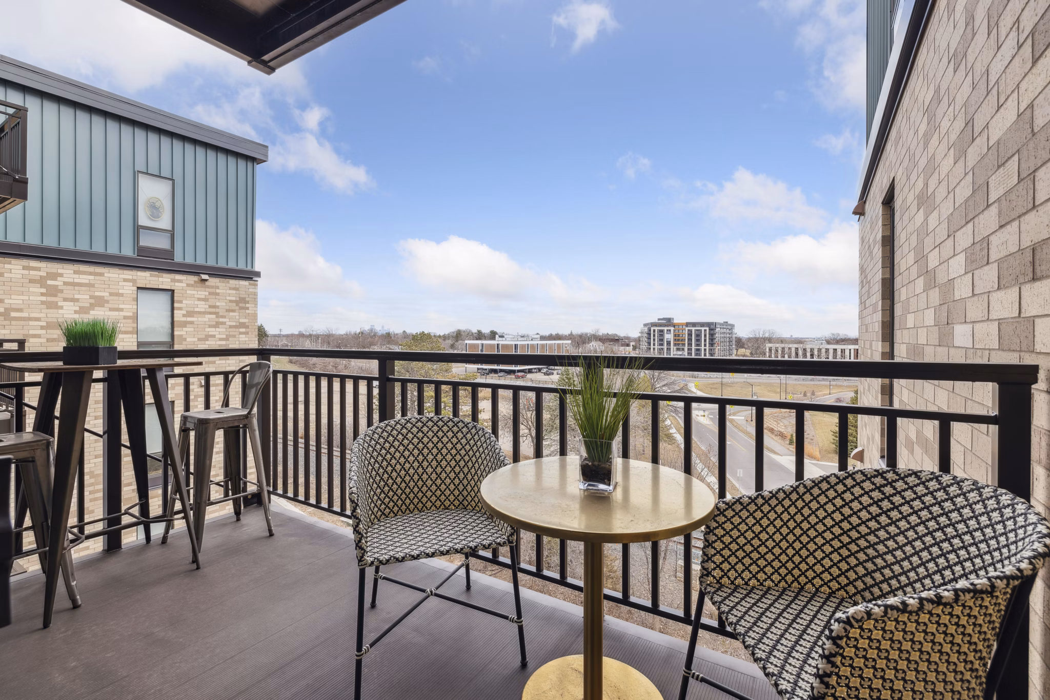 Scenic patio with modern seating at Avidor Edina Apartments offering luxury living experience