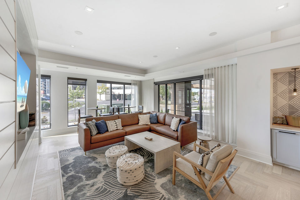 Elegant clubhouse with modern decor at Avidor Minnetonka Apartments featuring luxury amenities and social spaces