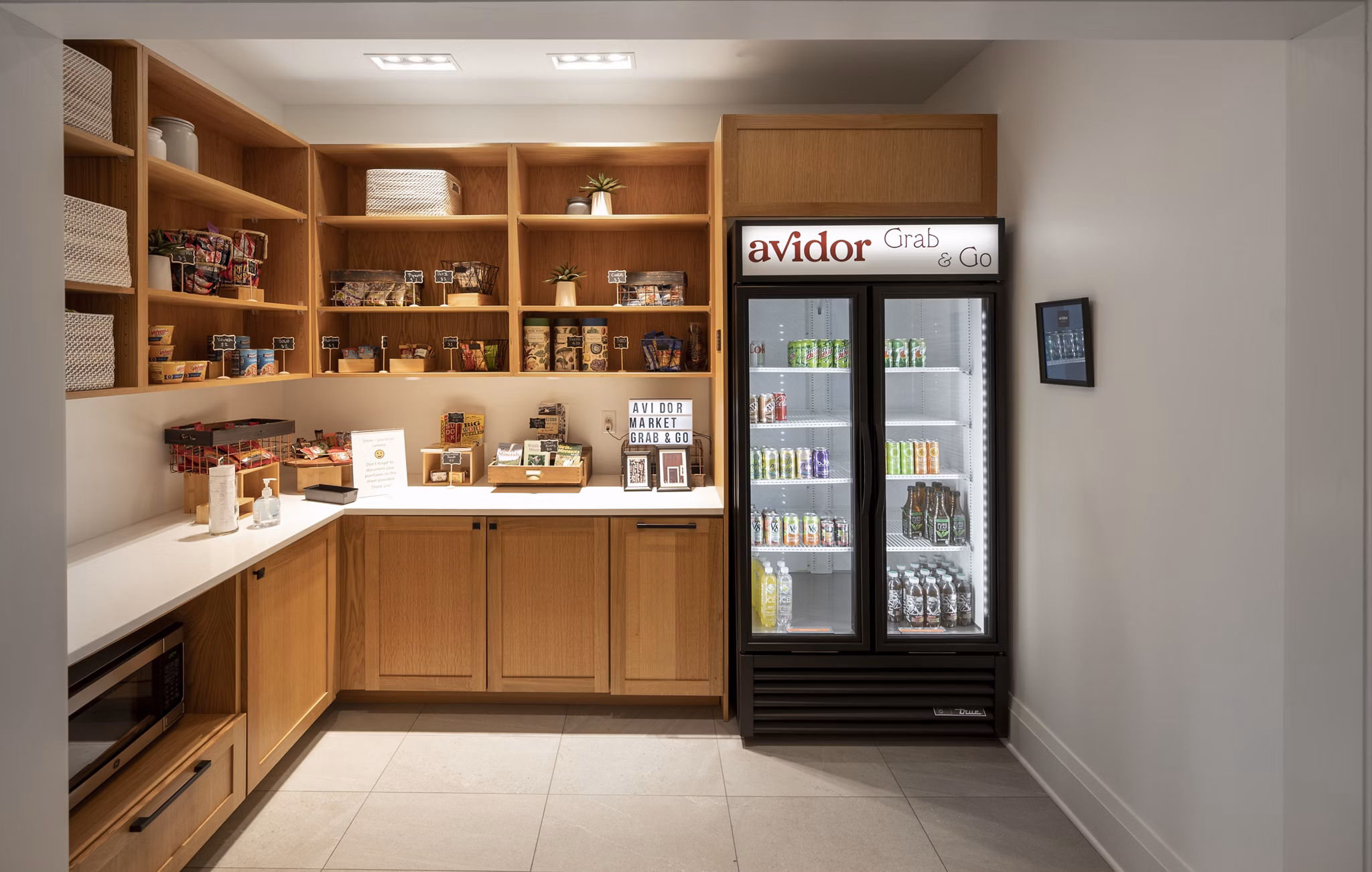Elegant clubhouse with cozy seating and modern decor at Avidor Minnetonka Apartments