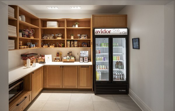 Elegant clubhouse with cozy seating and modern decor at Avidor Minnetonka Apartments