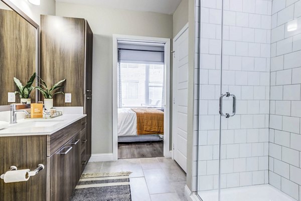 Bathroom with modern fixtures and sleek design at Zoey Apartments