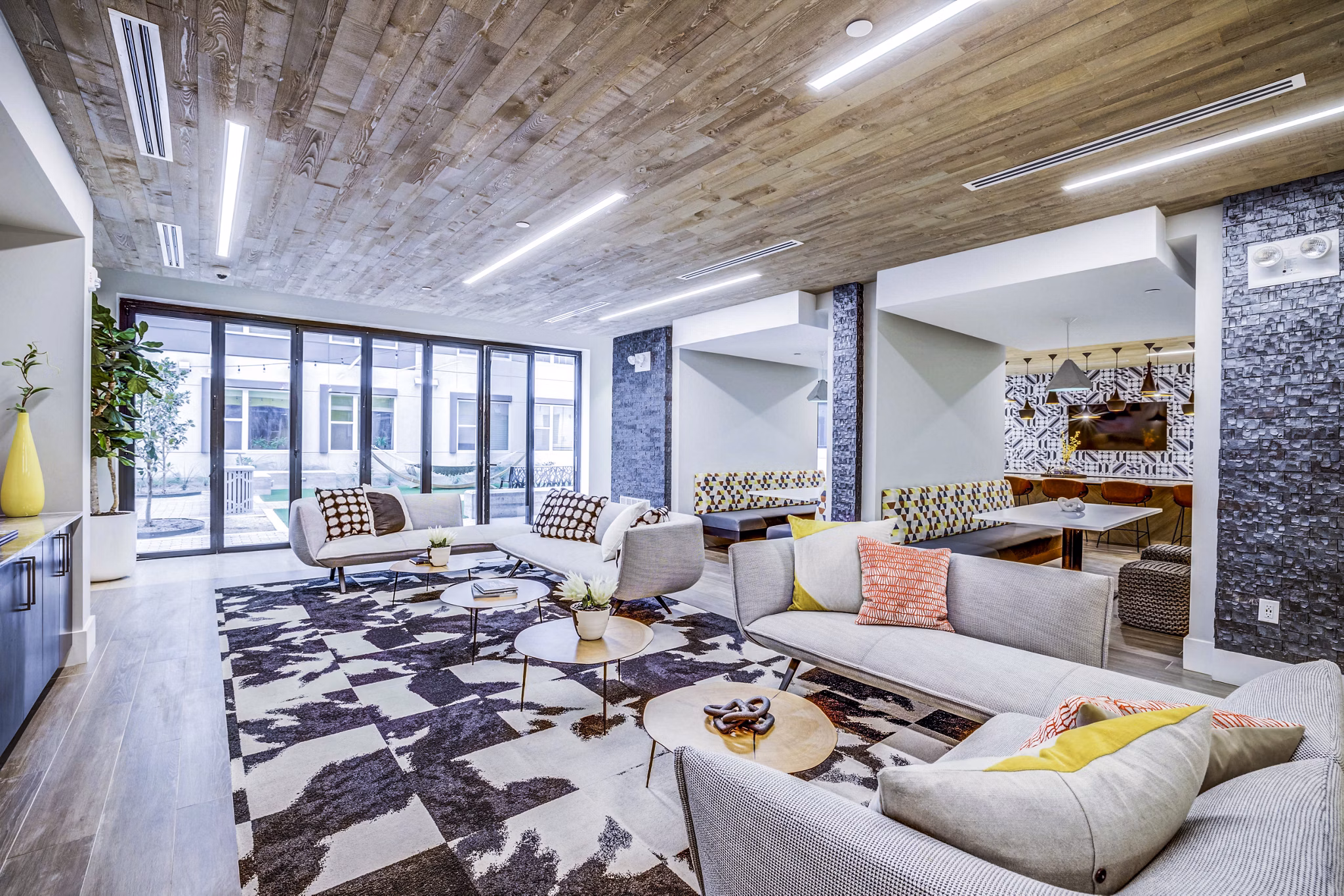Elegant clubhouse lobby with contemporary furnishings at Zoey Apartments
