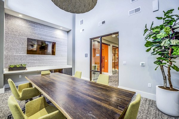 Modern clubhouse and meeting facility at Zoey Apartments featuring flexible gathering spaces and stylish design
