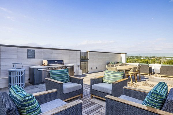 grill area/patio at Zoey Apartments