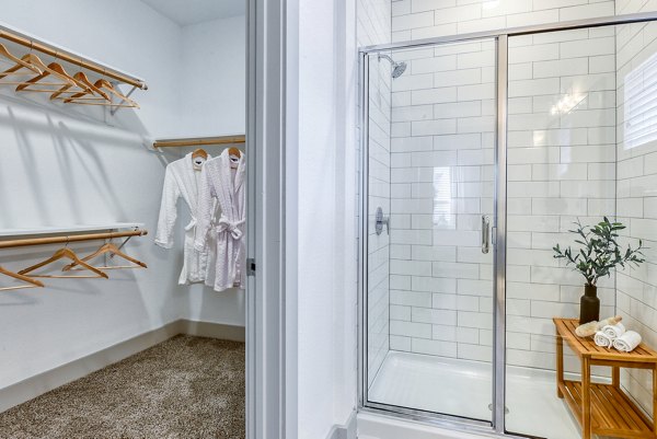 Luxurious bathroom featuring modern fixtures and elegant decor in Tacara Dove Creek Apartments