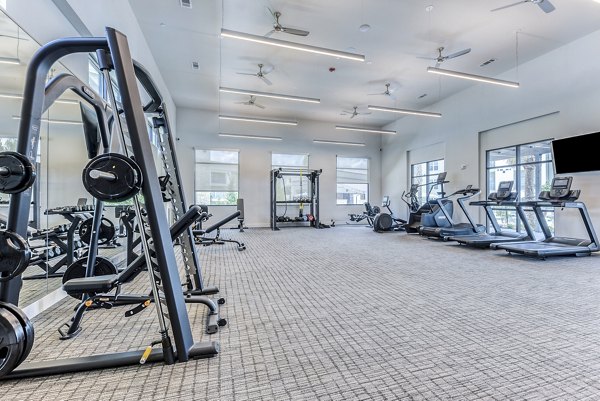 Tacara Dove Creek Apartments: Modern fitness center with state-of-the-art equipment in a luxury setting