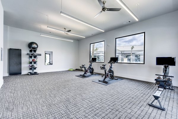 State-of-the-art yoga/spin studio with modern equipment at Tacara Dove Creek Apartments
