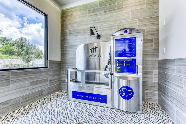 Convenient dog wash station at Tacara Dove Creek Apartments, perfect for pet owners seeking luxury living in Greystar community