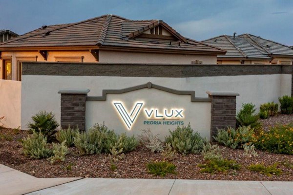 Vlux at Sunset Farms Apartments: Contemporary building showcasing modern luxury living