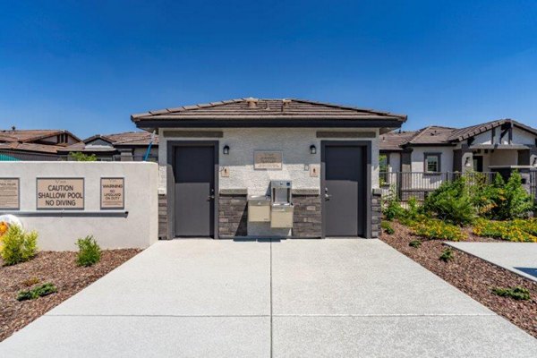 Vlux at Sunset Farms: Modern luxury apartment building in scenic location