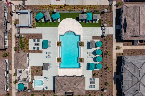 Vlux at Sunset Farms: Scenic view of luxury apartments surrounded by lush greenery