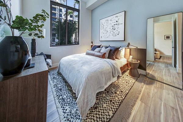 Cozy bedroom with modern decor at The Ellsworth Apartments: Luxury living by Greystar in vibrant city location
