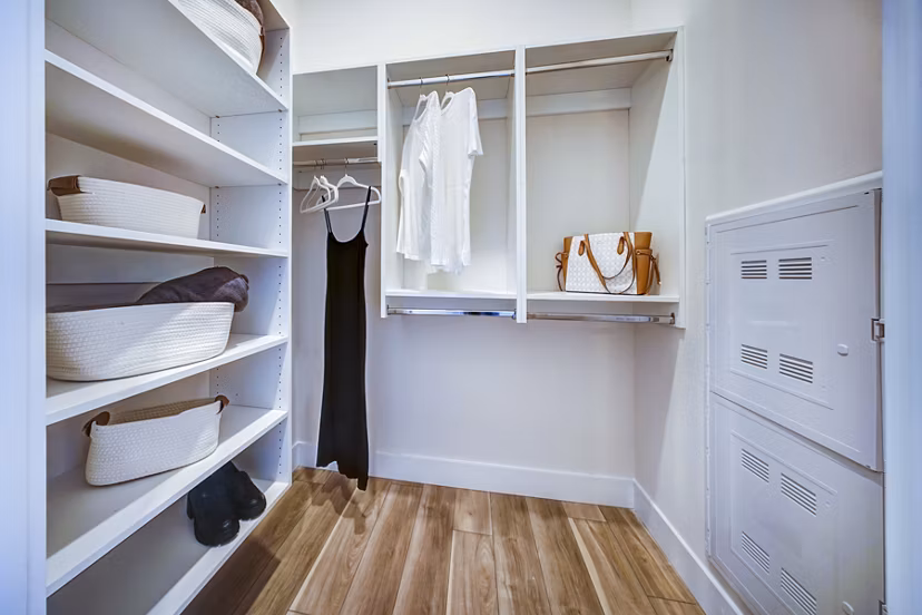 The Ellsworth Apartments: Spacious bedroom closet with custom shelving and ample storage options